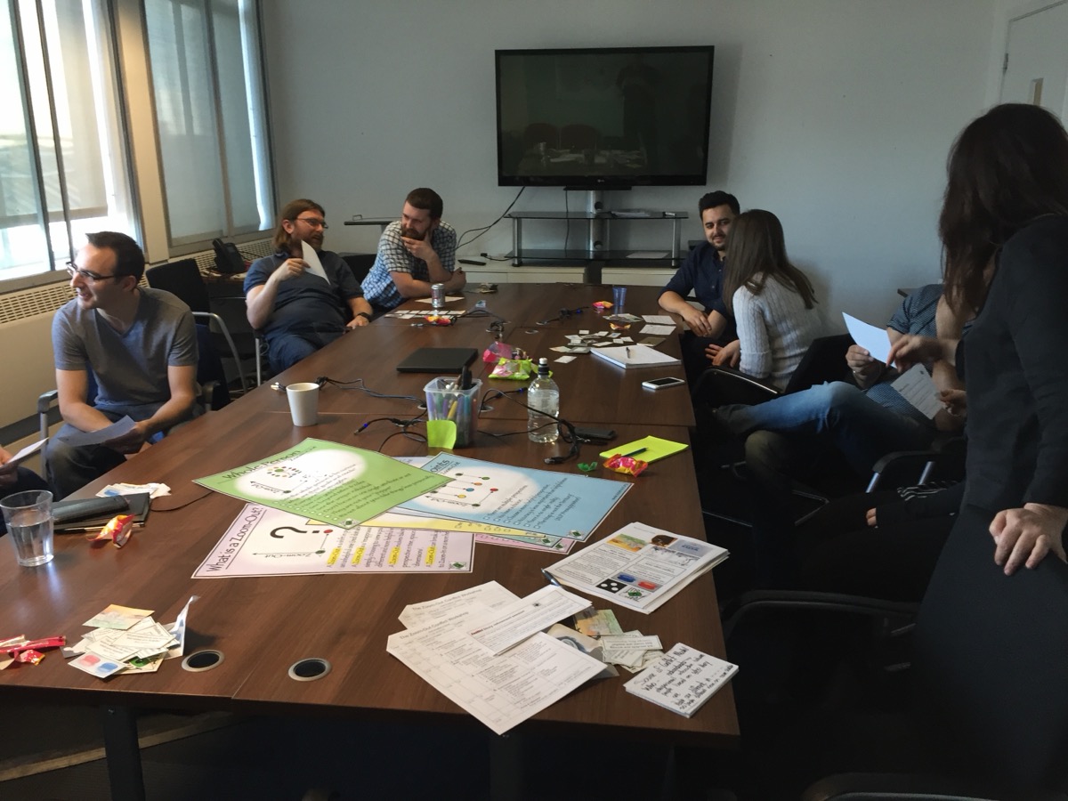 Participants discussing around the table